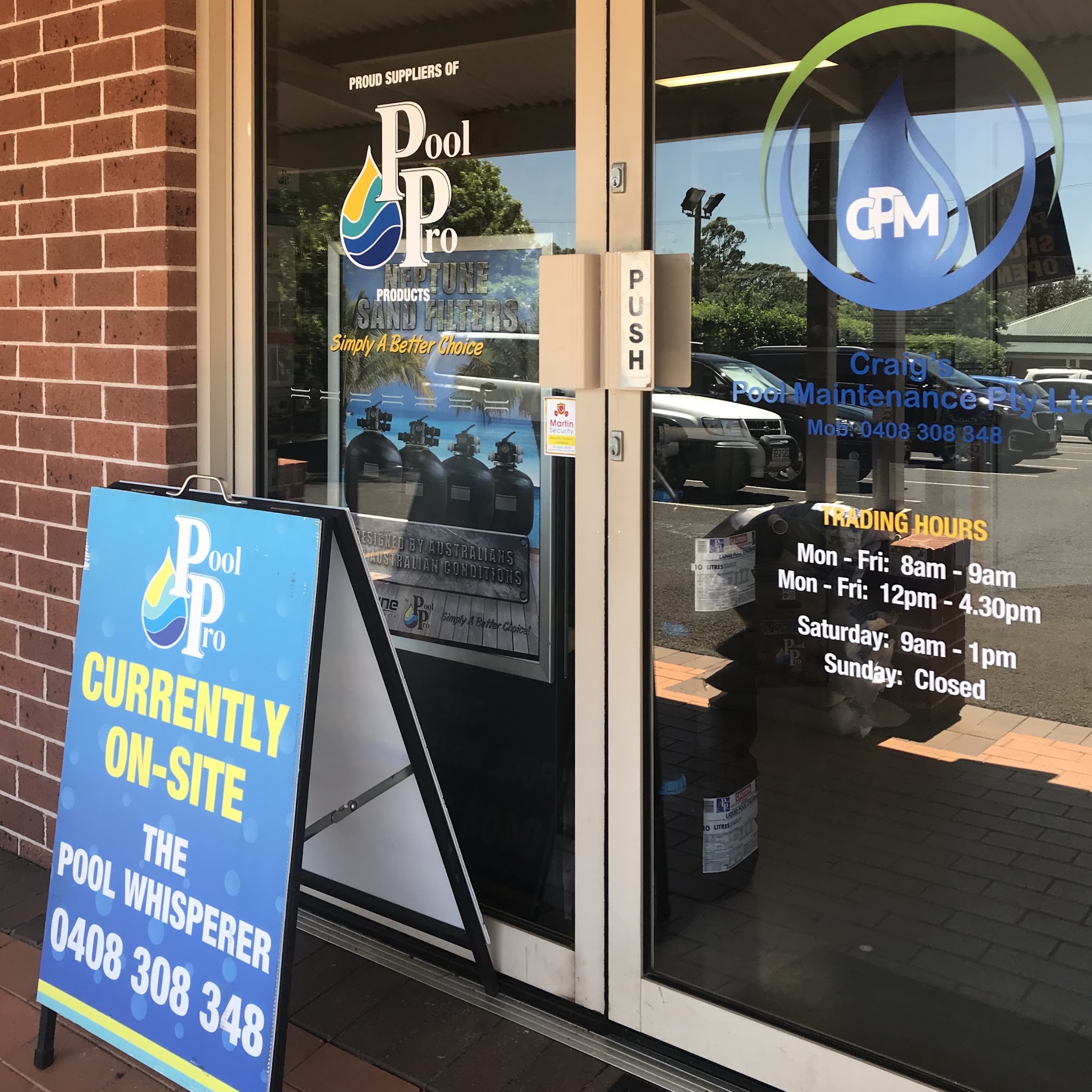 The Craig’s Pool Maintenance shopfront door with the CPM decal and trading hours sign
